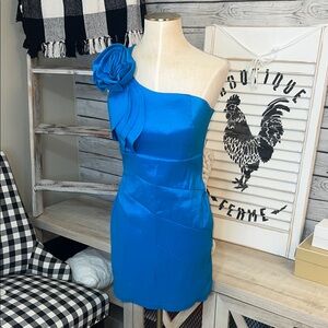 Elegant One-Shoulder Blue Dress with Floral Accent
